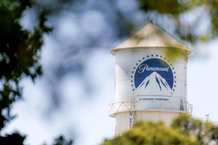 <p id='anchor-4bcda7' class='body-graf'>David Ellison continues to put his stamp on Paramount after its acquisition by Skydance.</p>
<p id='anchor-639153' class='body-graf'>The CEO and chairman told employees Thursday that they will be expected to work in the office five days a week starting Jan. 5, 2026, according to a memo obtained by CNBC. Employees who do not wish to make the transition can seek a buyout starting Thursday and until Sept. 15.</p>
<div id='taboolaReadMoreBelow'></div>
<p id='anchor-4337f3' class='body-graf'>“To achieve what we’ve set out to do — and to truly unlock Paramount’s full potential — we must make meaningful changes that position us for long-term success,” Ellison wrote to staffers. “These changes are about building a stronger, more connected, and agile organization that can deliver on our goals and compete at the highest level. We have a lot to accomplish and we’re moving fast. We need to all be rowing in the same direction. And especially when you’re dealing with a creative business like ours, that begins with being together in person.”</p>
<p id='anchor-d01747' class='body-graf'>The move could help Paramount thin the herd ahead of looming staffing cuts.</p>
<p id='anchor-e370b7' class='body-graf'>Variety reported last month that the company is expected to lay off between 2,000 and 3,000 employees as part of its postmerger cost-cutting measures. These cuts are slated for early November, Variety reported.</p>
<p id='anchor-c35fc3' class='body-graf'>Paramount is looking to take $2 billion in costs out of the conglomerate amid advertising losses and industrywide struggles with traditional cable networks.</p>
<p id='anchor-e24676' class='body-graf'>Phase one of Ellison’s back-to-work plan will see employees in Los Angeles and New York returning to a full five-day workweek in the new year.</p>
<p id='anchor-f2d1ba' class='body-graf'>Phase two will focus on offices outside LA and New York, including international locations. A similar buyout program will be offered in 2026 for those who operate in these locations.</p>
<p id='anchor-438d1a' class='body-graf'>“We recognize this represents a significant change for many, and we’re committed to supporting you throughout this transition,” Ellison wrote. “We will work closely with managers to ensure you have the time and flexibility to make the necessary adjustments.”</p>
<p></p>
<div>This post appeared first on NBC NEWS</div>
<br>