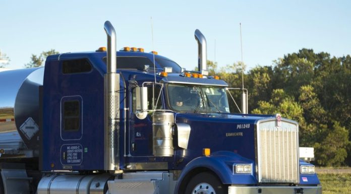 Trump says U.S. will impose new tariffs on heavy trucks, drugs and kitchen cabinets