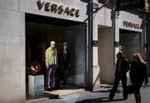 Prada Group says it has purchased fashion rival Versace in a deal worth nearly $1.4 billion